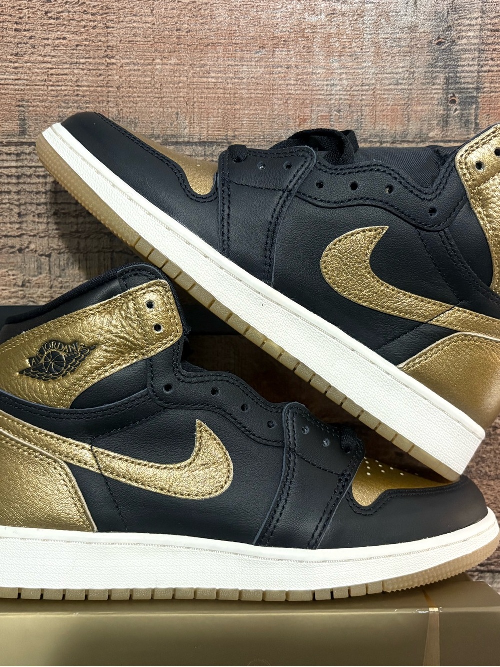 Nike Air Jordan mids Black and gold Sneakers with Gold Swoosh